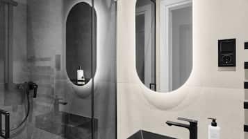 Designer toiletries, hair dryer, towels, soap