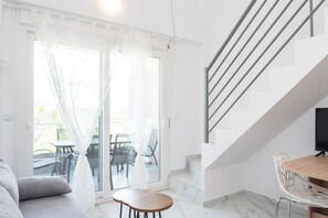 Loft, 2 Bedrooms | Living area | Flat-screen TV