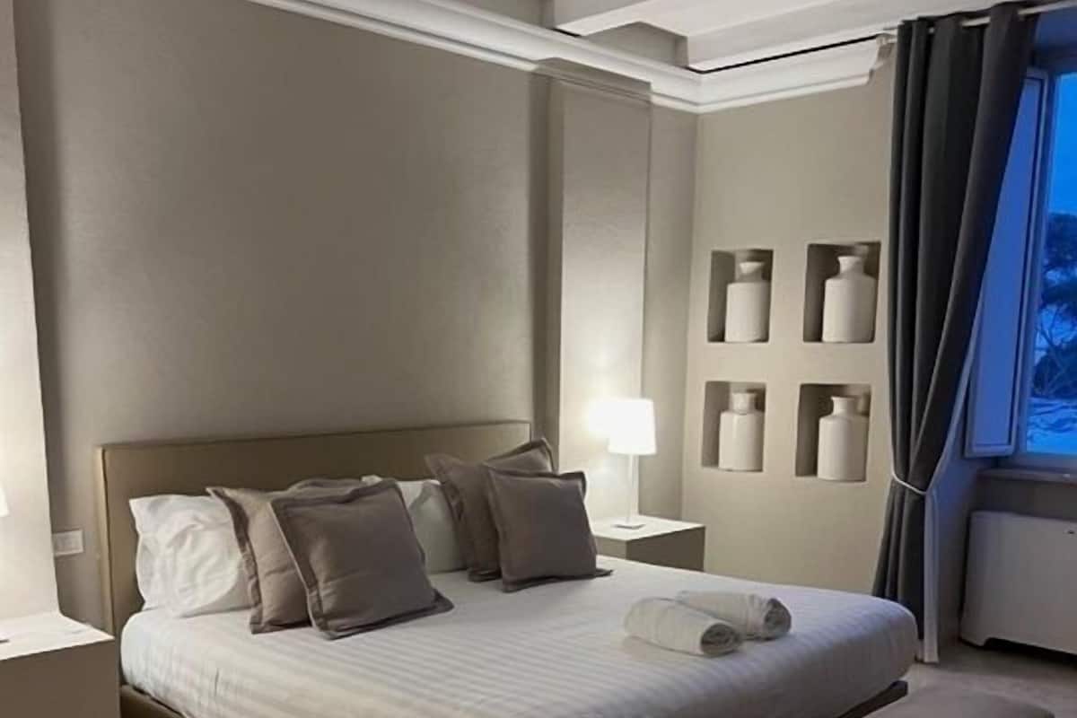 Suite Junior | 1 camera, biancheria da letto di alta qualità, copriletto in piuma