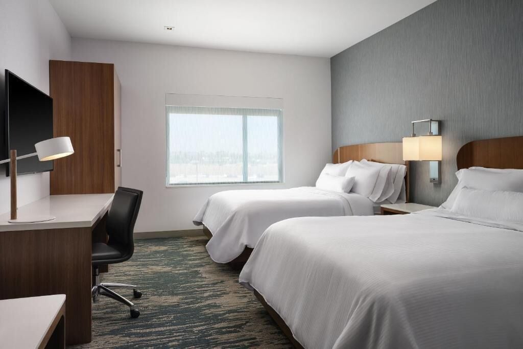 Modern Suites and Family Fun: Steps from Disney and Free Breakfast