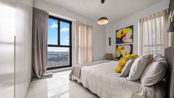 2 dormitorios, tabla de planchar con plancha, cuna de viaje y wifi