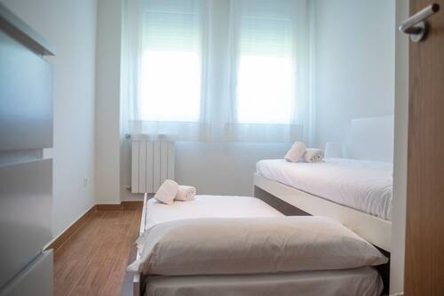 Apartment, 2 Bedrooms, Terrace, Beachside | Travel crib, bed sheets