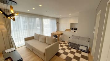 Exclusive Villa, Non Smoking | Living area | Flat-screen TV, heated floors