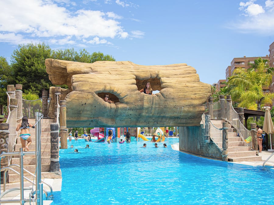 Seasonal outdoor pool, pool loungers, lifeguards on site