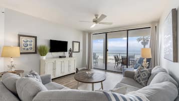 Signature Condo, 3 Bedrooms, Balcony, Beach View | Living room | 50-inch Smart TV with cable channels