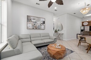Condo, Multiple Beds, Patio (ESCAPE 1) | Living area | 50-inch flat-screen TV with cable channels - Modern Ground flr Condo 1/2 Block to Beach w Pool! (South Padre Island)
