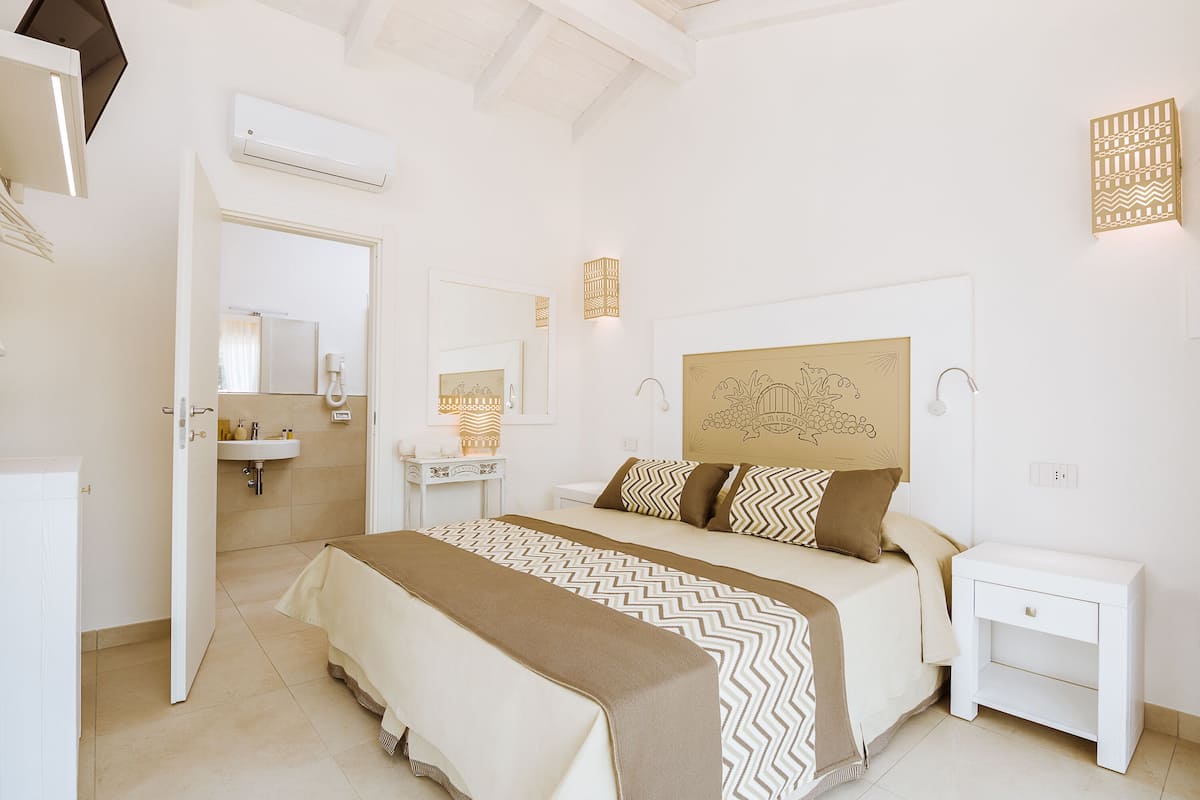 Sábanas italianas Frette, ropa de cama de alta calidad y minibar