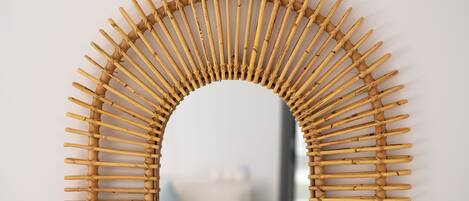 A wall-mounted bamboo arch structure.