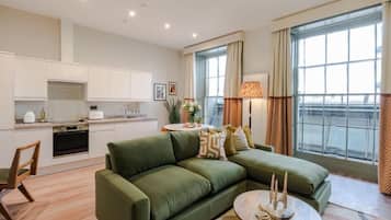 Comfort Apartment | Living area | 42-inch Smart TV with digital channels