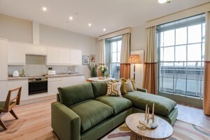 Comfort Apartment | Living area | 42-inch Smart TV with digital channels