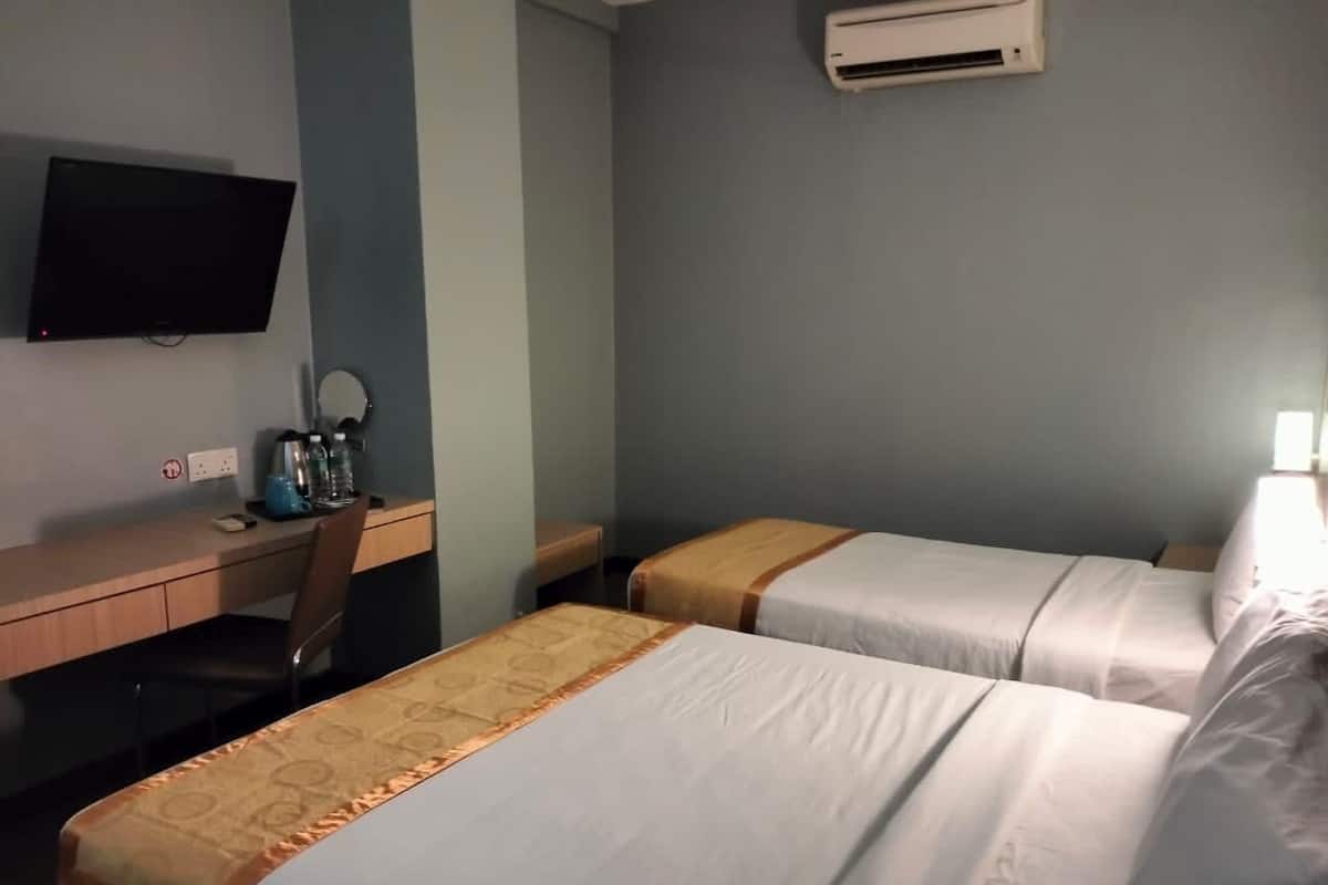 Premium bedding, desk, laptop workspace, free WiFi