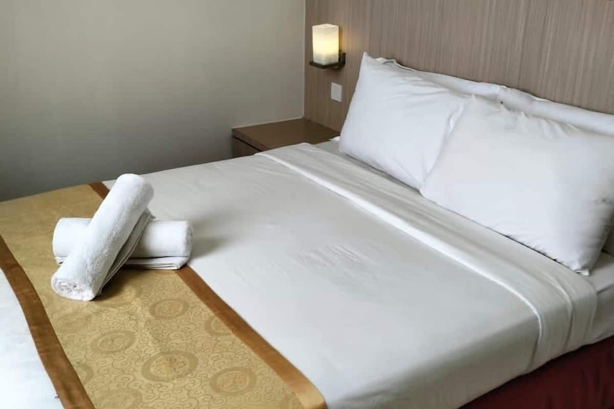 Premium bedding, desk, laptop workspace, free WiFi