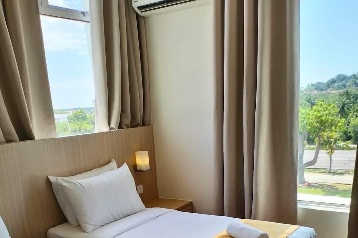 Premium bedding, desk, laptop workspace, free WiFi