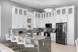 Fridge, microwave, oven, stovetop - 751 SeaGlass Elegance · Heated Pool · Walk 2 Beach (Naples)