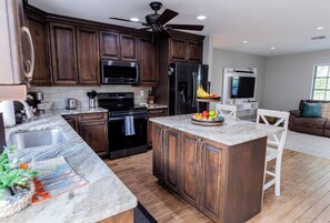 Fridge, microwave, oven, stovetop - 798 Barefoot Bungalow ·Heated Pool/Spa· Bike2Beach (Naples)
