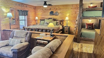 Escritorio, tabla de planchar con plancha, wifi y ropa de cama