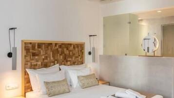 In-room safe, laptop workspace, blackout drapes, soundproofing