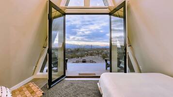 1 bedroom, desk, iron/ironing board, travel crib