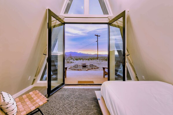 1 bedroom, desk, iron/ironing board, travel cot