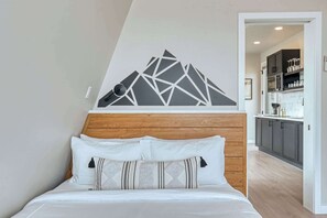 1 bedroom, desk, iron/ironing board, travel crib