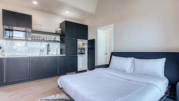 1 bedroom, desk, iron/ironing board, travel crib