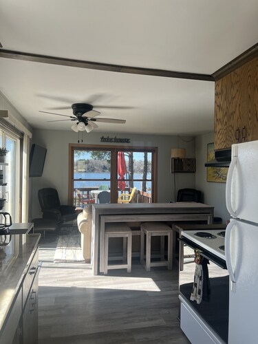 Julia’s Lakefront Cottage…updated cabin, private dock  & beautiful sunsets.