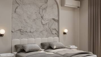 Luxe beddengoed, een minibar met enkele gratis items