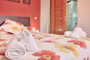 4 slaapkamers, een strijkplank/strijkijzer, gratis wifi, beddengoed