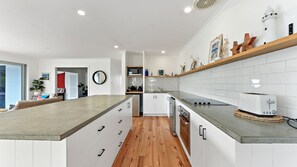 Fridge, microwave, oven, stovetop - Beach House at Low Head - Pet Friendly (Low Head)