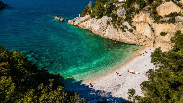 Private beach nearby, black sand, sun-loungers, beach umbrellas