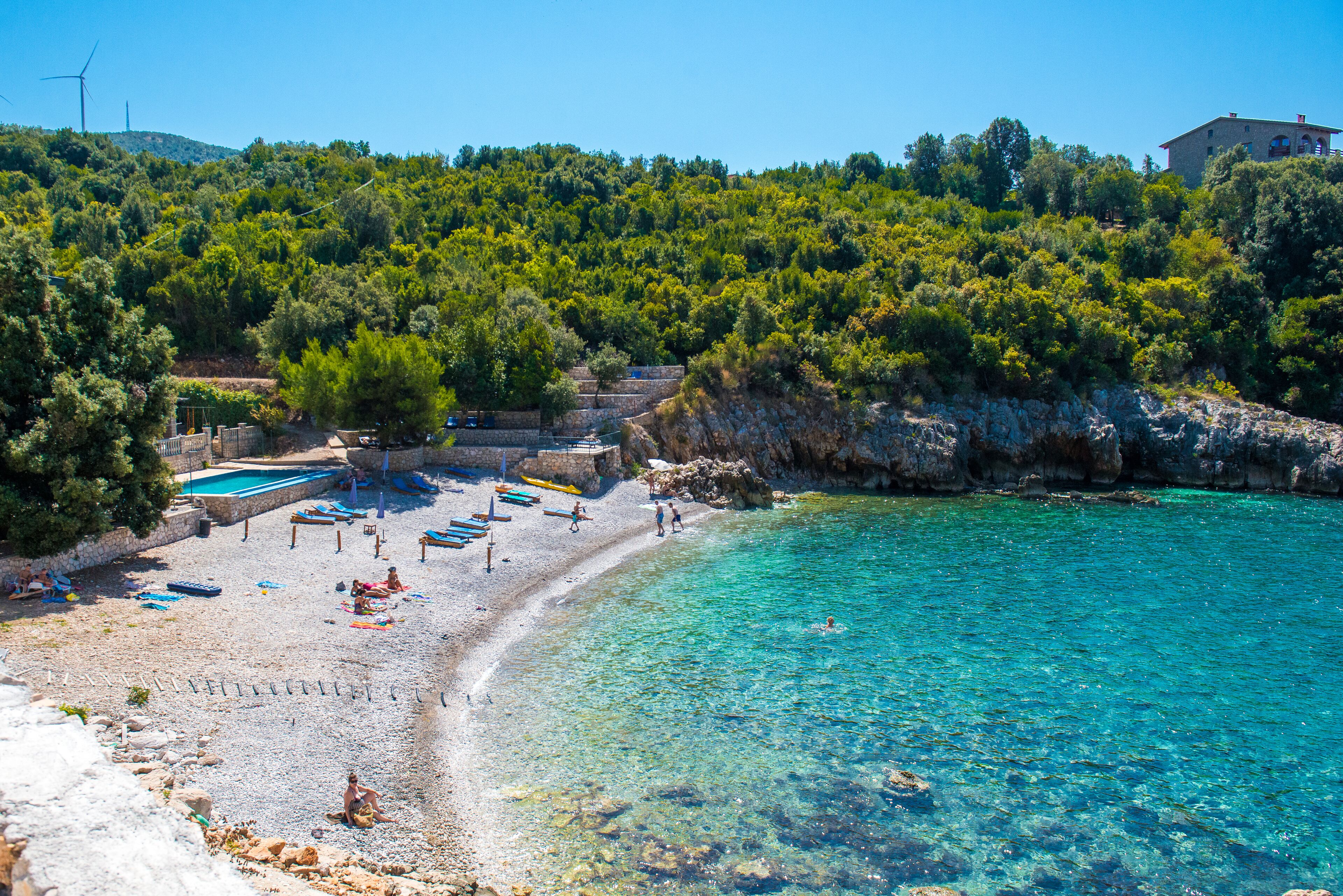 Private beach nearby, black sand, sun-loungers, beach umbrellas