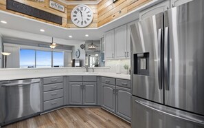 Fridge, microwave, oven, stovetop - Coral Reef #105 2 br/2ba condo on the ground level with direct pool access! (Panama City Beach)