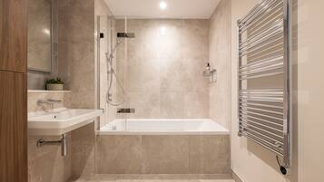 Hair dryer, towels, soap, shampoo