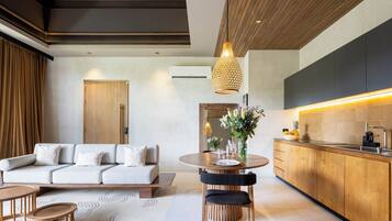 Luxury Loft, 1 Bedroom, Balcony, Garden View | Living area | 42-inch Smart TV with digital channels, books, streaming services