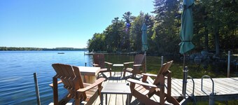 Beautiful open-concept log home in quiet setting on Thompson Lake.