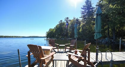 Beautiful open-concept log home in quiet setting on Thompson Lake.