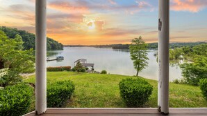 A gazebo overlooking a lake with a sunset view. - Enjoy luxury Sunsets at the Lake! (SEVIERVILLE)