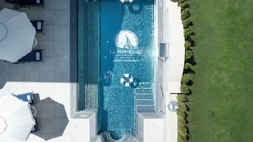 Indoor pool, outdoor pool, open 8:00 AM to 8:00 PM, free cabanas