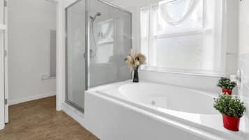 Jetted tub, hair dryer, towels, soap