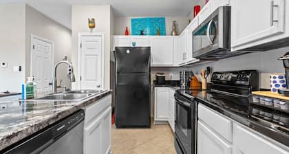 2 bed/2 bath, lake condo, ground floor, with boat slip, within 5 min. of bypass