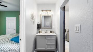 Hair dryer, towels, soap, shampoo