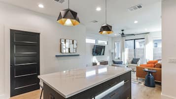 Townhome, Multiple Beds, Patio, Garden View (Chic Austin Getaway) | Private kitchen | Fridge, microwave, oven, stovetop