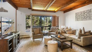 Townhome, Multiple Beds, Balcony | Living area | 50-inch flat-screen TV with digital channels, fireplace