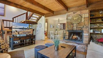 Townhome, Multiple Beds, Balcony | Living area | 50-inch flat-screen TV with digital channels, fireplace