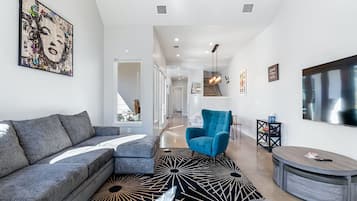 House, Multiple Beds, Kitchen, Garden View (The Marilyn) | Living area | 50-inch flat-screen TV with digital channels