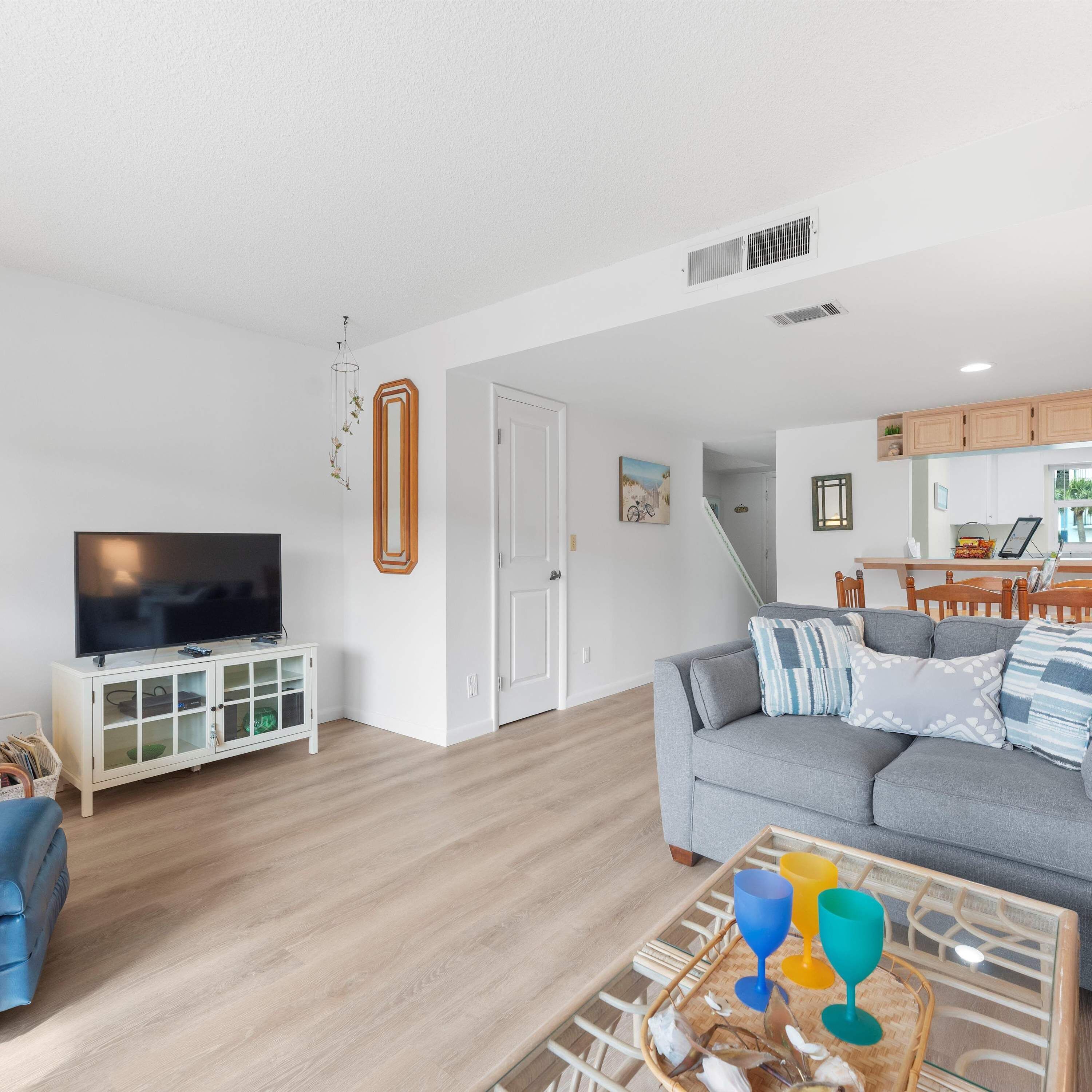 Condo, Multiple Beds, Balcony, Pool View (Sea You Soon at Cocoa Beach) | Living area | 42-inch flat-screen TV with digital channels