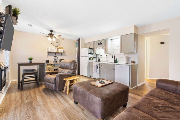 Condo, 1 King Bed with Sofa bed, Balcony (Chandler’s Pondview Getaway) | Living area | 42-inch flat-screen TV with digital channels, fireplace