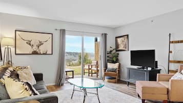 Condo, Multiple Beds, Patio, Garden View (Family-Friendly Retreat) | Living area | 42-inch flat-screen TV with digital channels