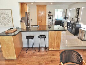 House, Multiple Beds, Patio, Garden View (Bellflower Breeze) | Private kitchen | Fridge, microwave, oven, stovetop - Bellflower Breeze Charming 3 BDR in Long Beach! (Long Beach)