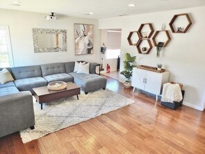House, Multiple Beds, Patio, Garden View (Bellflower Breeze) | Living area | 42-inch flat-screen TV with digital channels, fireplace, MP3 dock - Bellflower Breeze Charming 3 BDR in Long Beach! (Long Beach)